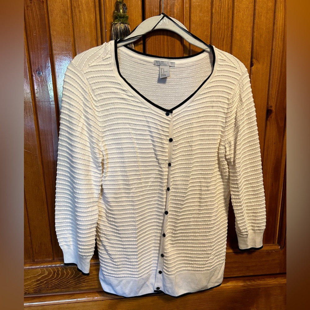 H&M size 8 White sweater with black trim.
